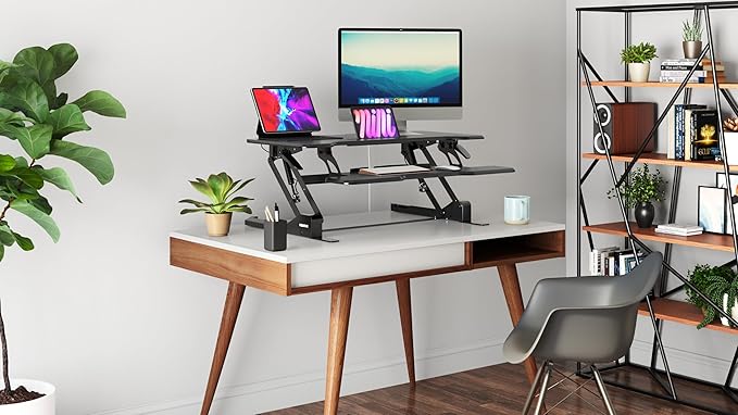 Mount-It! Height Adjustable Standing Desk Converter, 38” Wide, Stand Up Desk Riser for 2 Monitors, Manual Gas Spring Desktop Raises to 16.9", Fits Two Monitor Screens with Keyboard Mouse Tray in Black-DeskLoop Office