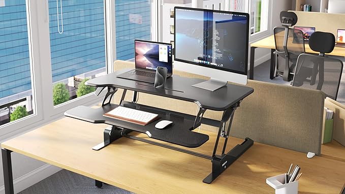 Mount-It! Height Adjustable Standing Desk Converter, 38” Wide, Stand Up Desk Riser for 2 Monitors, Manual Gas Spring Desktop Raises to 16.9", Fits Two Monitor Screens with Keyboard Mouse Tray in Black-DeskLoop Office