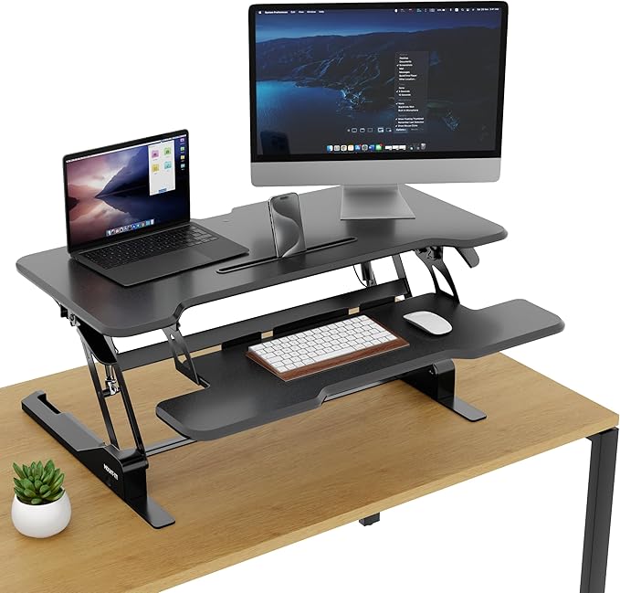 Mount-It! Height Adjustable Standing Desk Converter, 38” Wide, Stand Up Desk Riser for 2 Monitors, Manual Gas Spring Desktop Raises to 16.9", Fits Two Monitor Screens with Keyboard Mouse Tray in Black-DeskLoop Office